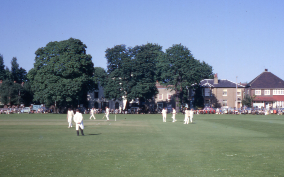 Cricket match on Lower Green, Mitcham, Surrey CR4. From the Clubhouse. looking east. 