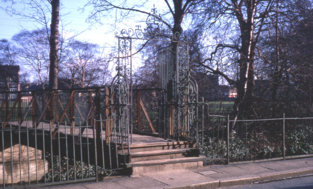 Gate and bridge to Wandle Park, Wandle Bank, Colliers Wood, London SW19. Leading to the site of Wandlebank House.