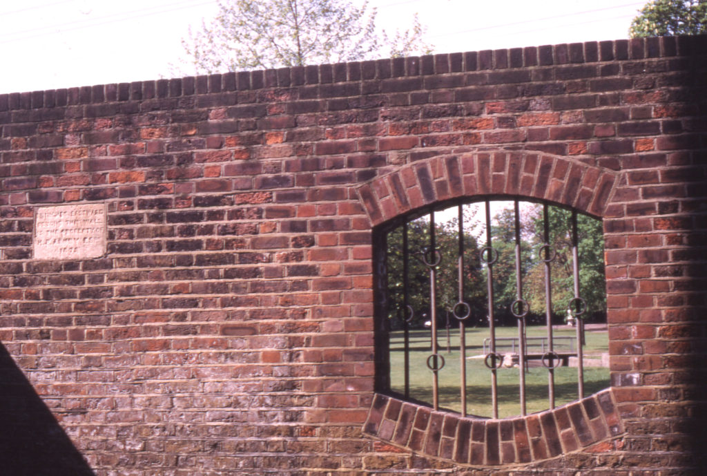 Location of boundary tablet on wall of Wandle Park, Colliers Wood, London SW19. Byegrove Road. rear of Newborough Court.