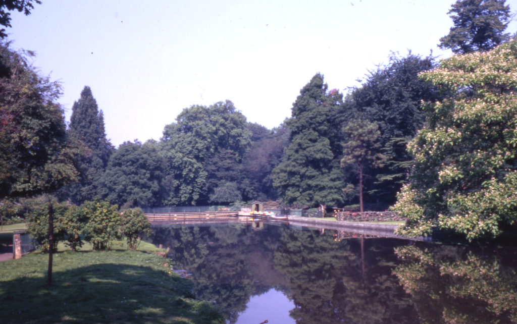 The Wandle in Ravensbury Park, Mitcham, Surrey CR4. Looking downstream (west) towards site of Manor House. The park formed part of the Bidder estate; the park was opened in May 1930.