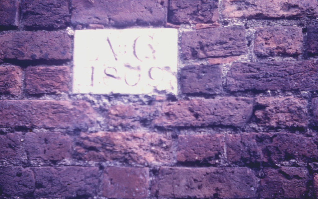Durham House - eastern boundary garden wall, Fair Green, Mitcham, Surrey CR4. Stone inserted by Abel Garroway.