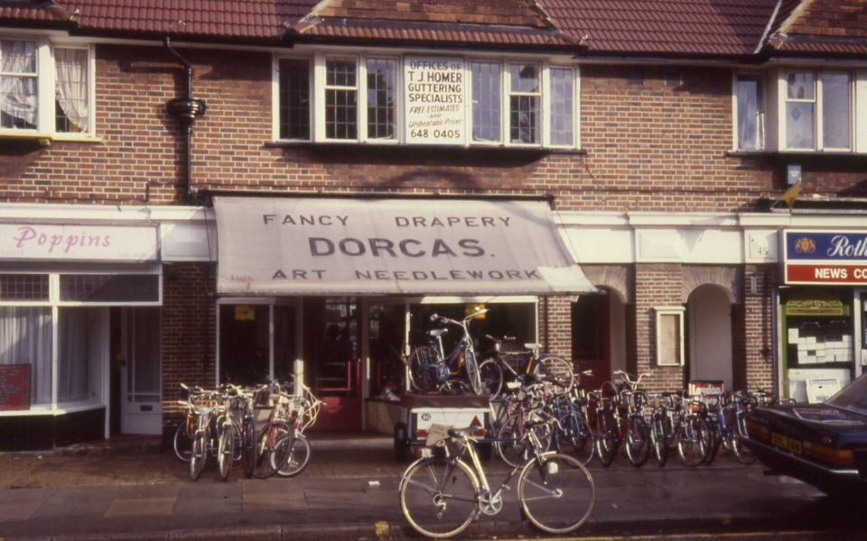 mhs-wjr-238-02 Epsom Road Shop 1984 (Pedals bikes Rutland Parade (moved Worcester Park) – awning reads Dorcas) 08-84